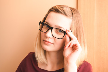 Beautiful young woman wearing glasses