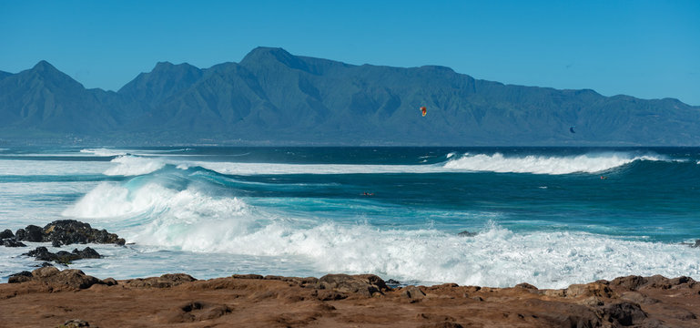 MAUI, HAWAII, USA - DECEMBER 10, 2013: Surfers are riding waves at hookipa beach
