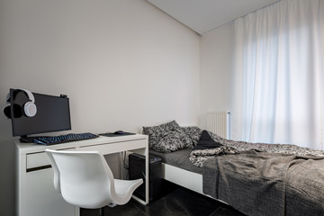 Bedroom with white desk