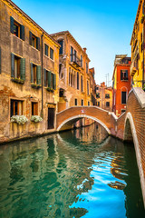 Venice cityscape, buildings, water canal and bridge. Italy