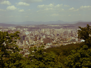 Retro styled view of Seoul from the Namsan Mountain, South Korea.