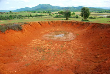 Bomb craters in the world's most heavily bombed place near the Plain of Jars archaeological site in...