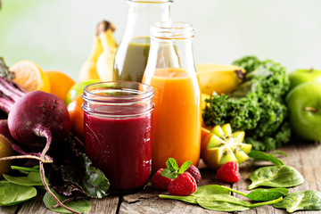 Fresh vegetable and fruit juices with beets, berries and greens