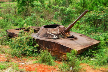 The remains of a bombed out Russian tank used by the Viet Cong in Loas during the Vietnam War
