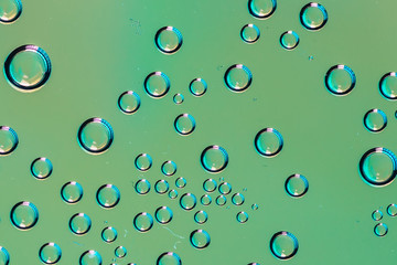 Small micro drops of water behind glass
