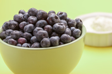Close up of bowl of blueberries.