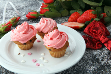 Delicious cupcake for Valentine Day. cake for Valentines day with chocolate and strawberries. Traditional homemade with red roses