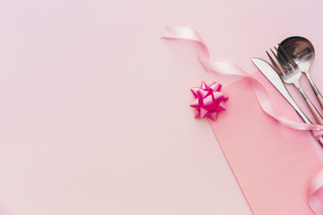 Fork, knife, spoon, silverware with pink on pink background for catering, menu, email, banner, restaurant party celebration