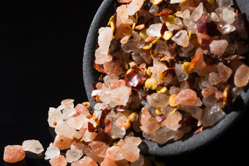 Macro collection, pink himalayan rock salt  mixed with spices and red chili pepper