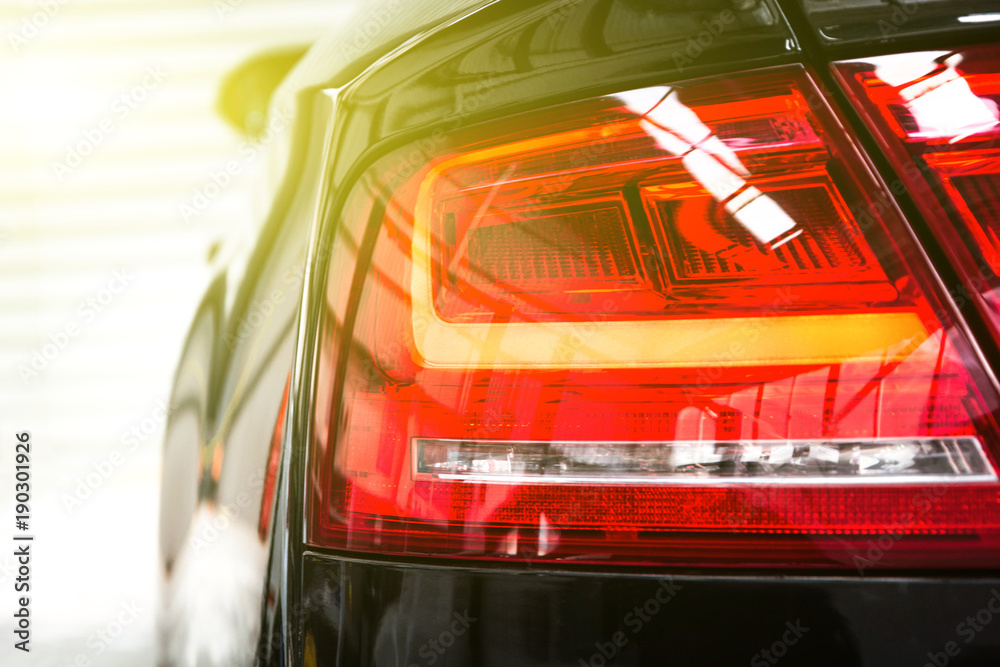 Wall mural Closeup of a taillight on a modern car