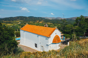 White chapel and mountains in the backgroud, Crete Island, Greece