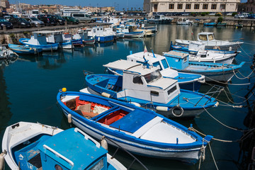 Boats in the harbor of Ortigia island in Syracuse