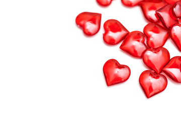 Obraz premium Red love hearts on a plain white background