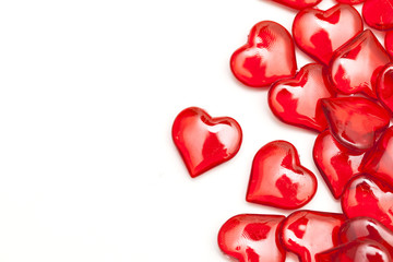Red love hearts on a plain white background