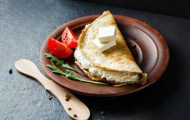 Omelet with cheese and vegetables