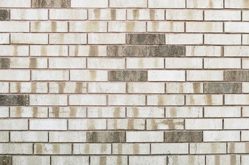 Old beige brick wall background texture