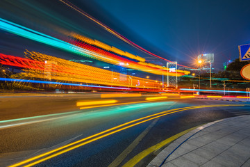 Vehicle light trails in city at night.