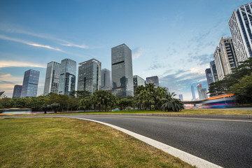 Fototapeta na wymiar empty asphalt road with city skyline background in china.