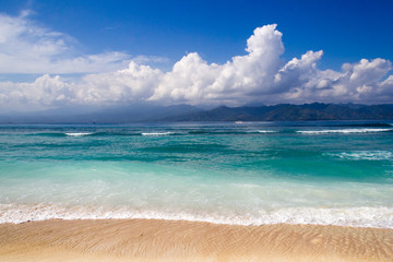 Dramatic clouds hover over mountains
