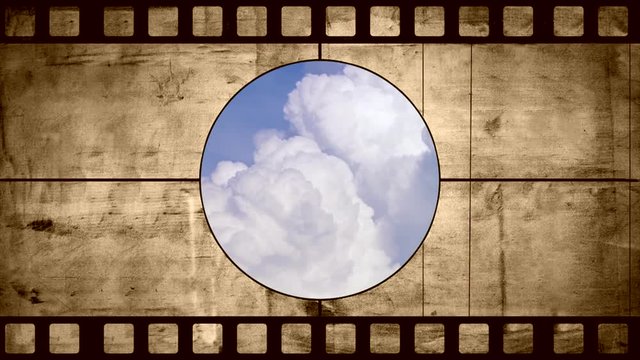Animation of old negative film with blue sky with clouds timelapse. White big cloud on blue sky. a big and fluffy cumulonimbus cloud in the blue sky. Edge of a large white cloud timelapse