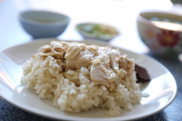 Hainanese chicken rice with cucumber in closeup , Thai food