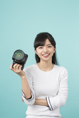 Fototapeta premium カメラを持った女性