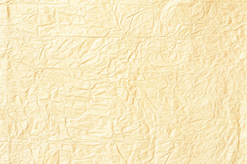 Crumpled yellow background paper texture