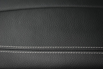 Leather texture background. Modern business car interior detail.