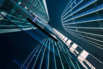 Fototapeta na wymiar low angle view of illuminated modern building exterior