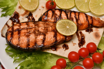 Grilled trout with fresh Greens