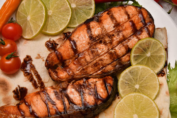 Grilled trout with fresh Greens