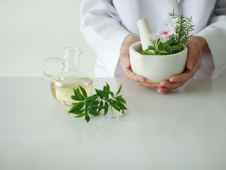 the scientist,dermatologist testing the organic natural  cosmetic product in the laboratory.research and development beauty skincare concept.blank package,bottle,container .cream,serum.hand