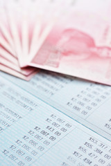 Close up saving account passbook and new Taiwan dollar