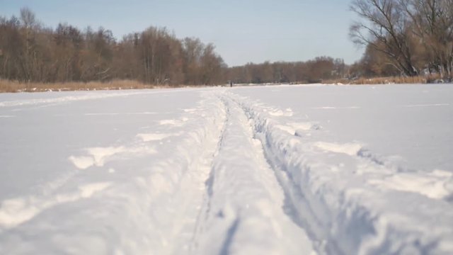 Ski track in fresh snow.