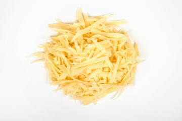 Heap of grated cheese, isolated on white background.