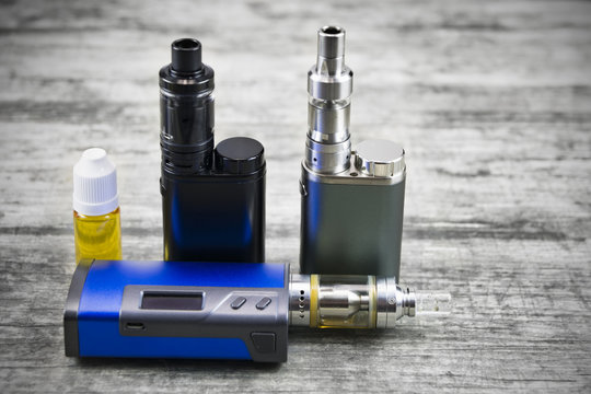 E - cigarette for vaping , technical devices.The liquid in the bottle