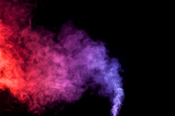 Cloud of smoke of purple, red and orange colors on black  isolated background. Background from the smoke of vape