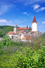 Fototapeta na wymiar medieval gothic royal castle with ramparts Krivoklat near Rakovnik, Central Bohemia region, Czech republic. National cultural landmark.