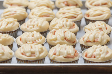 Bakery top view fresh raw dough roll in tray