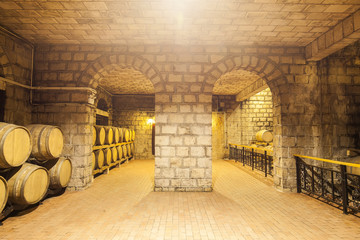 Fototapeta na wymiar Wine Cellar with Wooden Barrels