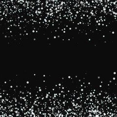 Amazing falling snow. Scattered border with amazing falling snow on black background. Adorable Vector illustration.