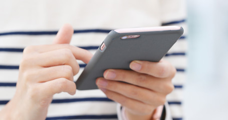 Woman working on cellphone