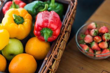 Chilli peppers and vegetables in basket, healthy food concept.