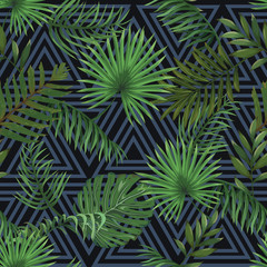 Seamless pattern with leaves of palm trees on a dark background with a triangular ornament