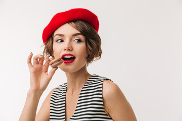 Fototapeta premium Portrait of a pretty woman wearing red beret