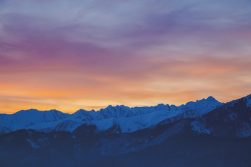 Sunrise over snow Tatry mountains in winter time.