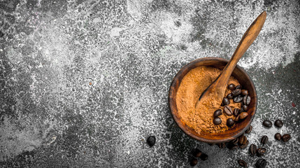 Ground coffee in a bowl.