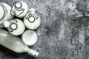 fresh milk. On rustic background.