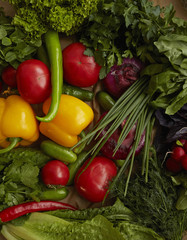Different raw vegetables on craft paper background. Healthy nutrition.