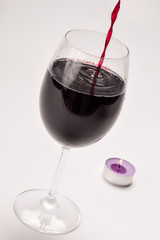 Red wine in a glass isolated on white background - realistic photo image - with clip path